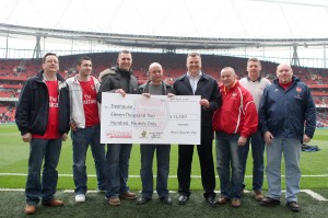 MASC member Mark amongst those presenting the cheque to Nick Hornby